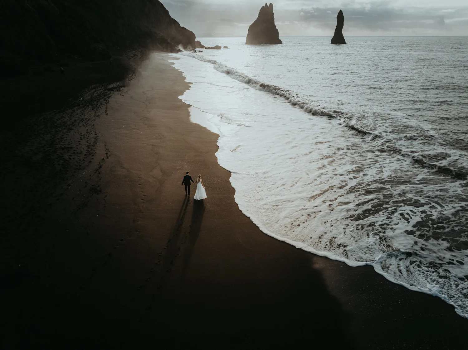 Reynisfjara Black Beach in Iceland is the most beautiful beach and if you thinking of eloping in Iceland, this could you be your beach.